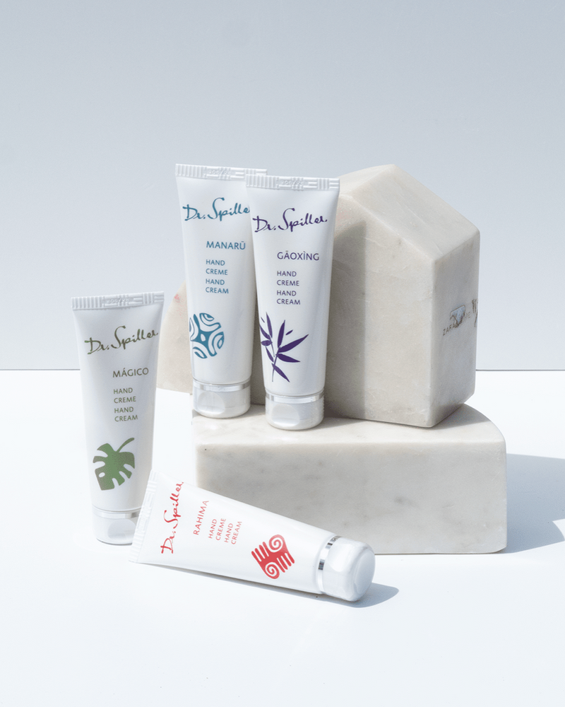 Set of Dr. Spiller hand cream tubes on a white background